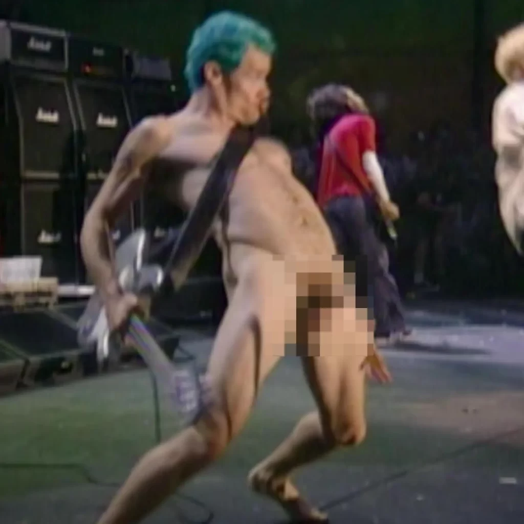 Flea from the Red Hot Chili Peppers naked on stage